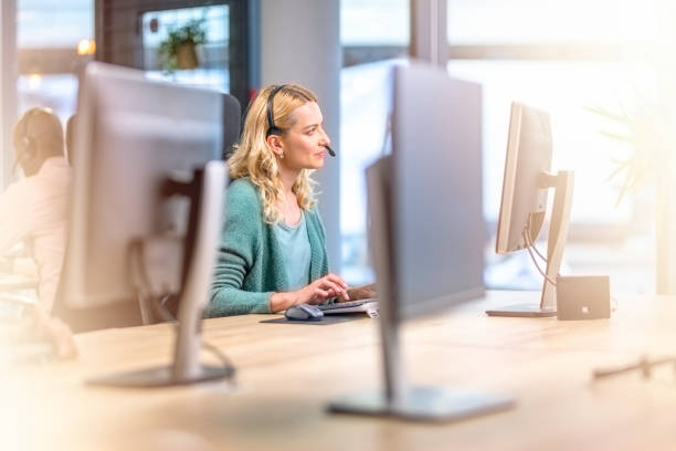 istock Blonde female call centre worker 1185978266