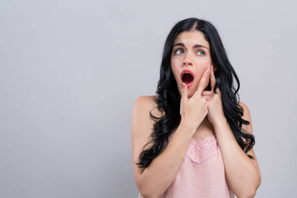 istock Young woman with skin blemish theme 1185978686