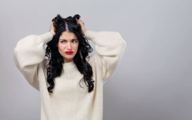 istock Young woman feeling stressed 1185978704