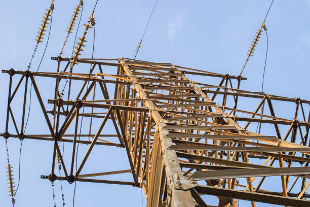 istock technologies electricity on wires with insulators and high power electric voltage 1185979749