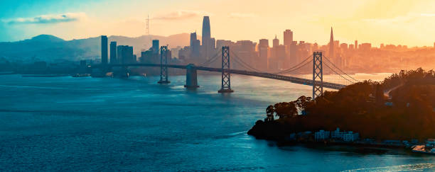 aerial view of the bay bridge in san francisco - san francisco bay area fotos imagens e fotografias de stock