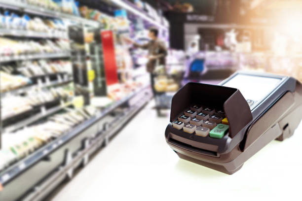 istock Credit card machine on isolated white background 1185998175