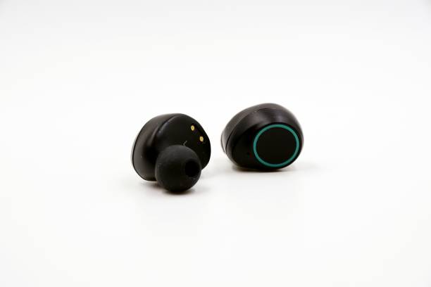 istock Black and green wireless Bluetooth headphones 1185998996