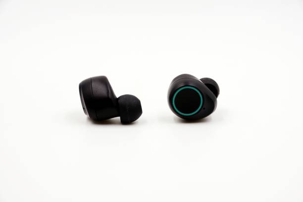 istock Black and green wireless Bluetooth headphones 1185999234