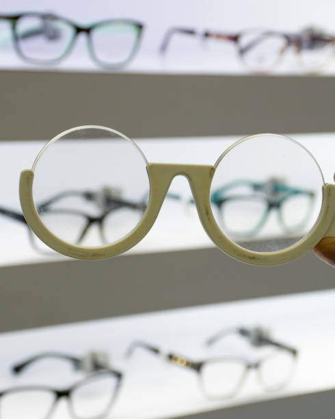 istock Eyeglasses frame in the hand of the optometrist 1186006721