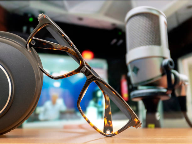 Eyeglasses, headphones and professional mic