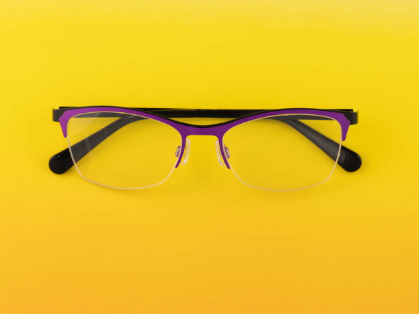 istock Eyeglasses isolated, yellow background 1186008491