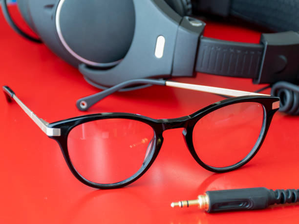 istock Black eyeglasses with headphones 1186008492