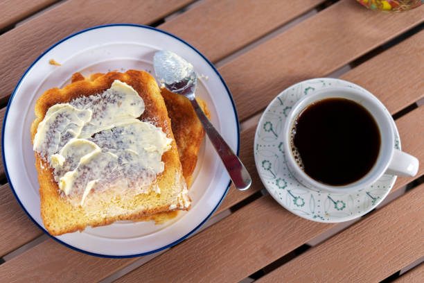 istock butter toast and coffee 1186010053
