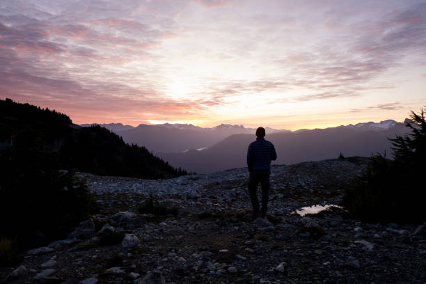 istock Hiker enjoying the early morning sunrise 1186010061