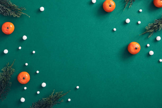 istock Christmas composition on dark green background 1186013795