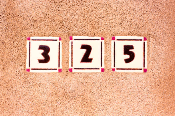 istock Ceramic Number 325 Street Address Tiles; Brown Wall 1186013922