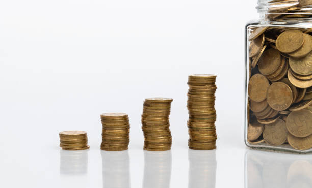 istock Coin stairs and jar on white background 1186019647