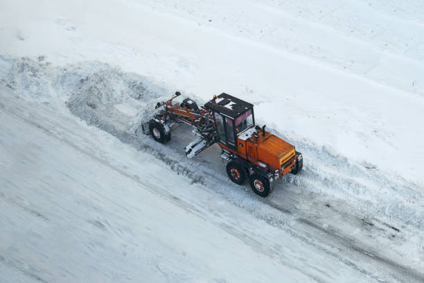 istock Snow blower clean roads from fallen snow. 1186022797