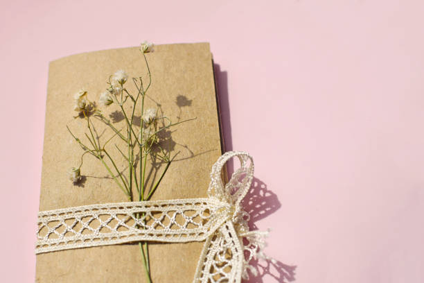 istock Retro style wedding invitation. Greeting card on a pink background. 1186023879