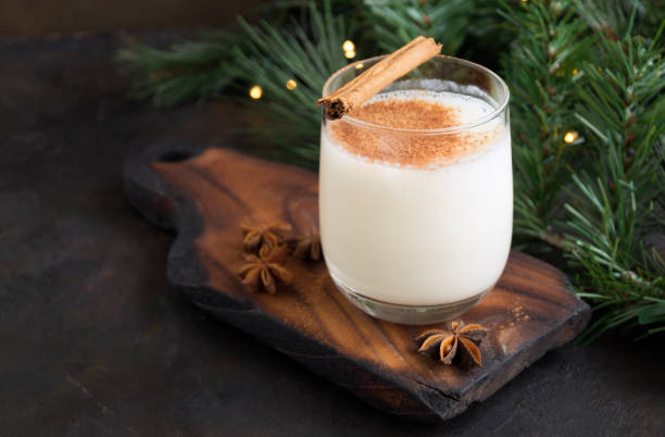 istock Cocktail eggnog on a background of bokeh lights. 1186031146
