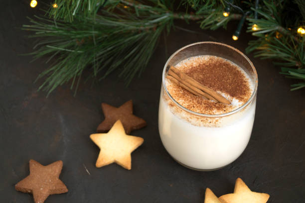 istock Cocktail eggnog on a background of bokeh lights. 1186031249