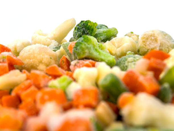 istock Sliced frozen vegetables on a white background. 1186032258