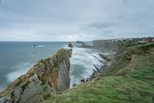 Wide angle landscape photography of Arnia beach in Cantabria, northern Spain