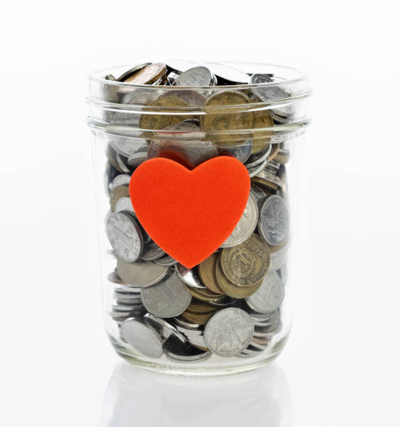 istock Saving money for charity concept 1186035278