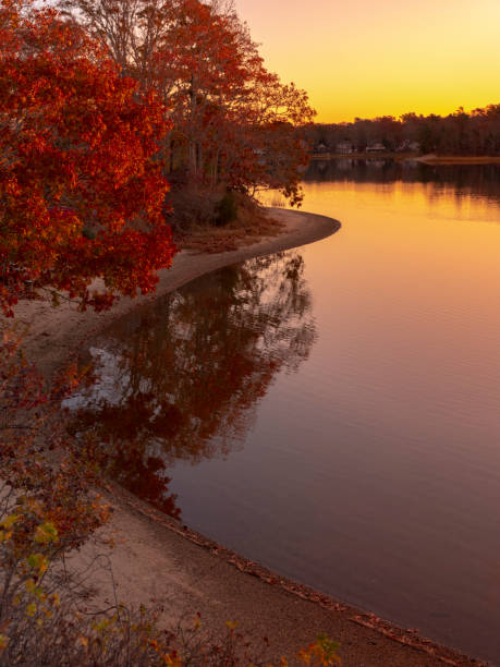 istock Autumn lakeside at sunset 1186048162