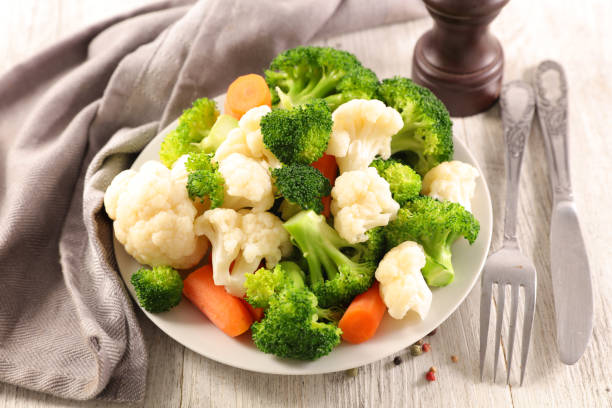 istock cauliflower, broccoli and carrot- vegetarian meal 1186048640