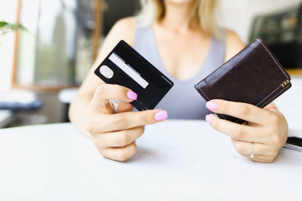 istock Focus on credit card and leather wallet 1186051342