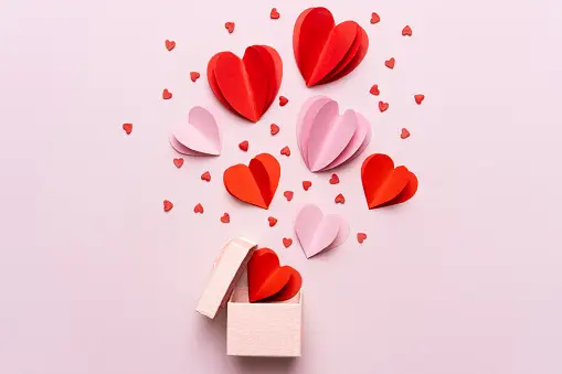 https://media.istockphoto.com/id/1186052506/photo/valentine-day-composition-with-gift-box-and-red-hearts-photo-template-on-pink-background.webp?b=1&s=170667a&w=0&k=20&c=_if-n-yEbMDIDB6HjV8yYJFM39pqf2ZJEjVUx5ZphTI=
