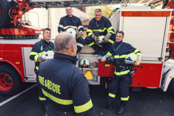 istock Senior fire chief conducting safety briefing with his team 1186054057