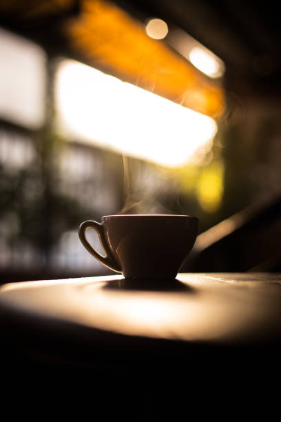 istock Steamy coffee cup in the sunlight 1186062715