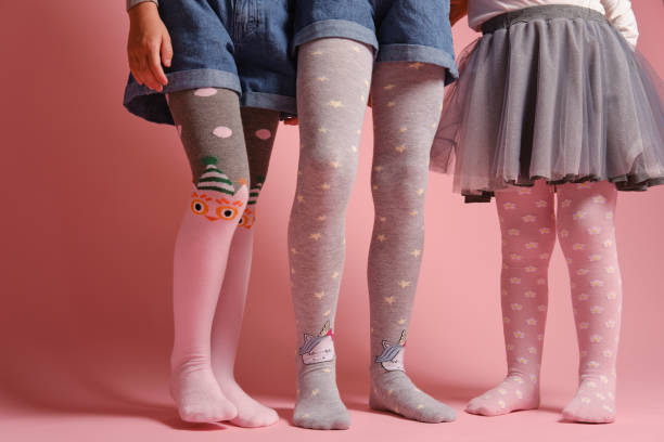 Legs Of Girls In Childrens Colorful Tights Photo - Download Image Now - Child, Pantyhose, Girls - iStock