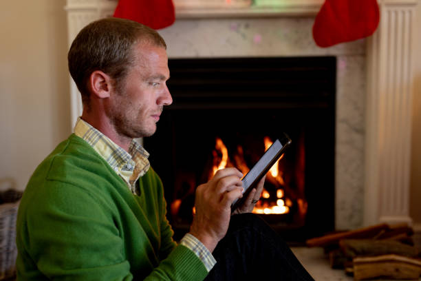 istock Man at home at Christmas time 1186067814