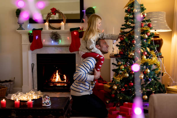 istock Family at home at Christmas time 1186069064