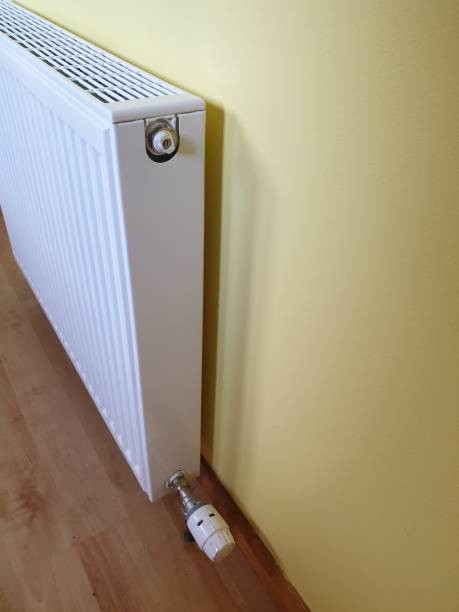 istock Side view of radiator for central heating 1186069238