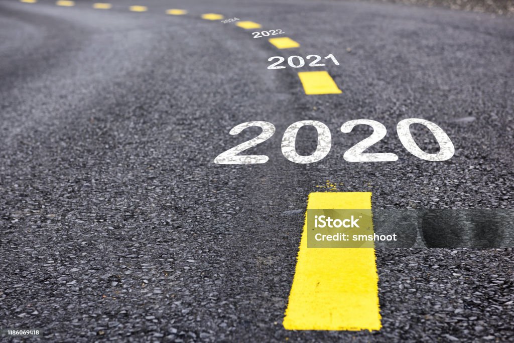 2020 happy new year concept Number of 2020 to 2022 on asphalt road surface with marking lines 2020 Stock Photo