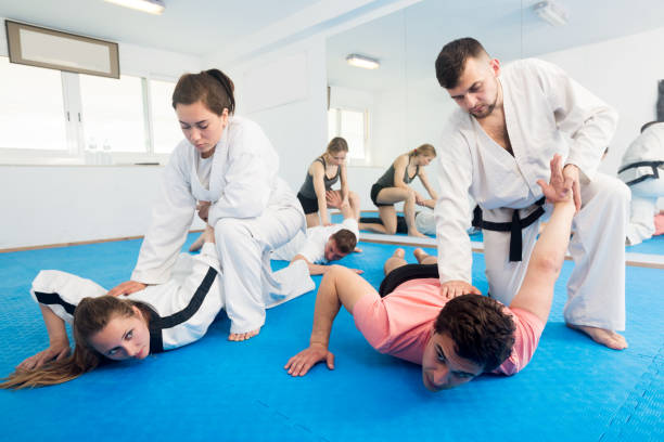 istock Adults training in pairs at taekwondo class 1186072386