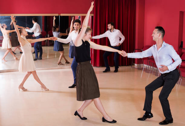istock People practicing vigorous lindy hop movements 1186073103