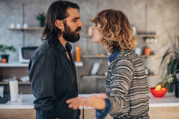 istock Young couple arguing at home 1186073933
