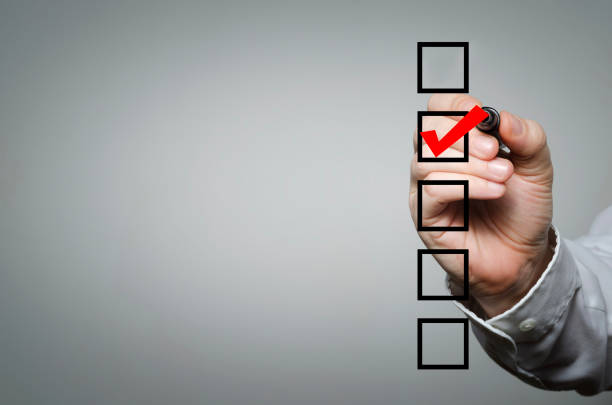 Checklist Blank checklist on the whiteboard with businessman hand drawing a red check mark in the check box form filling photos stock pictures, royalty-free photos & images