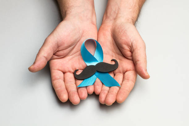 istock A black mustache and a blue ribbon 1186074276