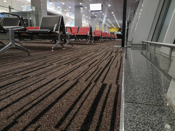 istock A white screen hangs from the ceiling above an empty waiting room at the station or at the airport 1186074842