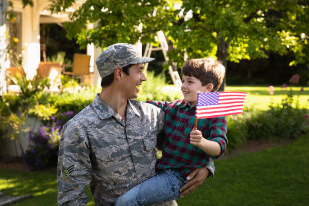 istock Soldier with son 1186075262