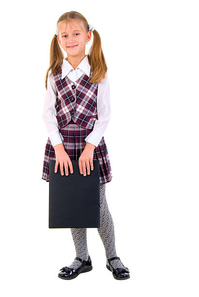 istock Little Schoolgirl With Black Folder. 118607560
