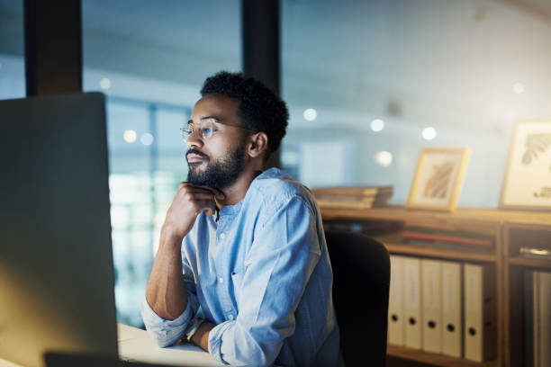 istock Putting his mind to the deadline 1186079116