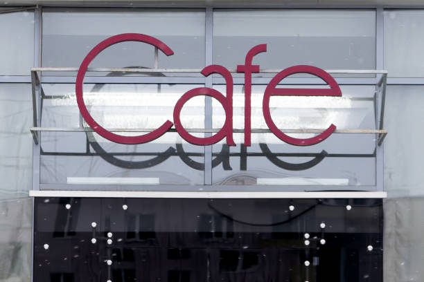istock Outdoor cafe sign on modern building 1186079497