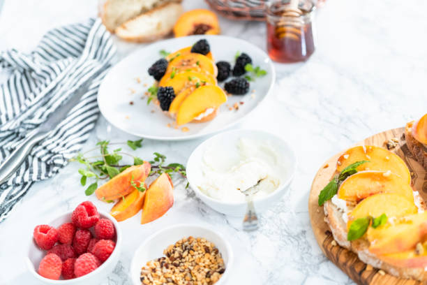 istock Ingredients for preparing peach ricotta toast 1186080860
