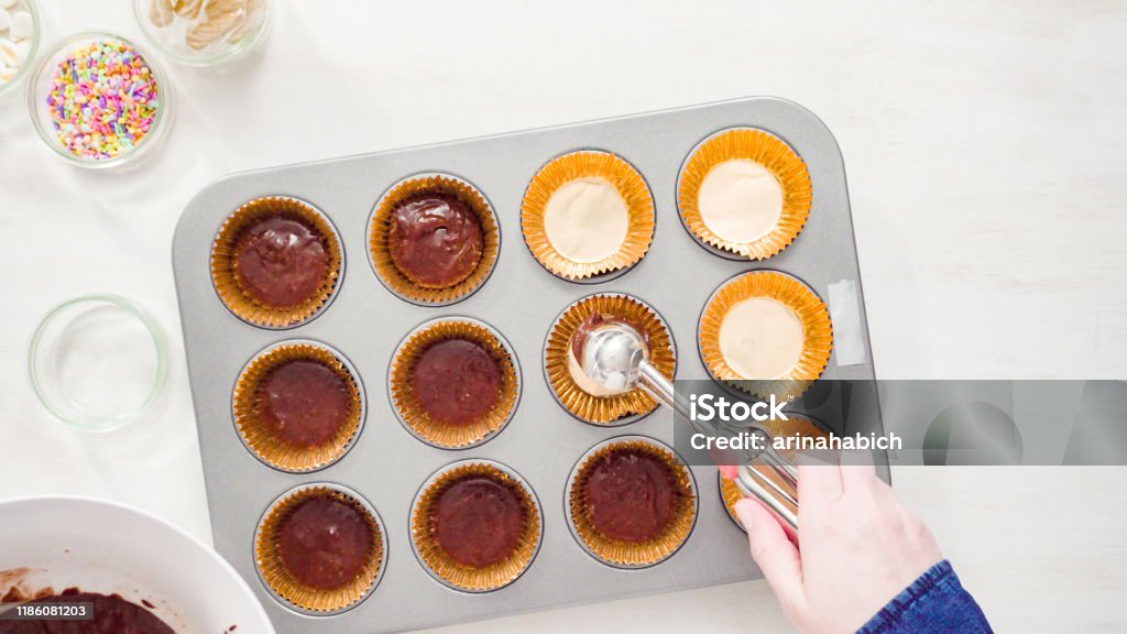 Scooping Batter With A Cupcake Scoop To Make Unicorn Cupcakes Stock Photo -  Download Image Now - iStock