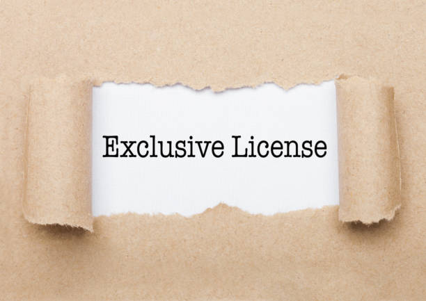 istock Exclusive License text appearing behind paper 1186084044