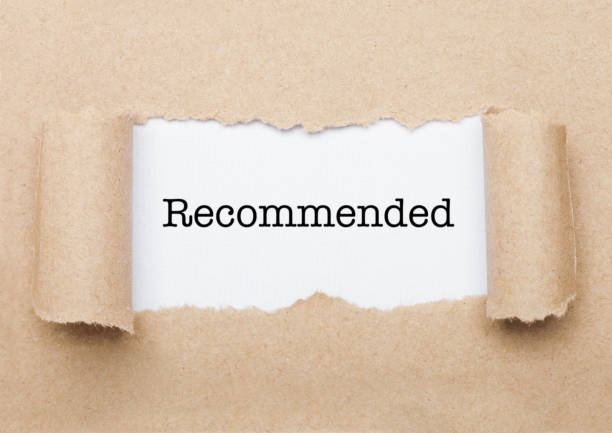 istock Recommended text appearing behind brown paper 1186084751