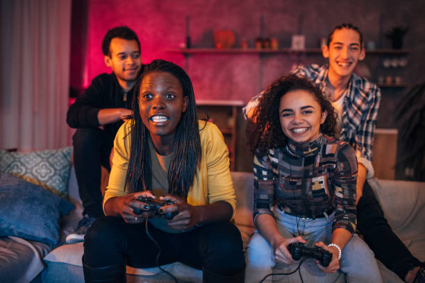 istock Women  playing video games 1186084949
